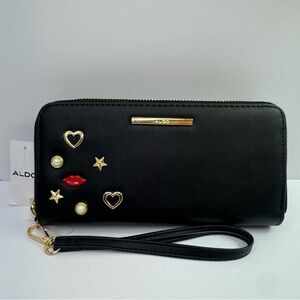 Aldo Black Wristlet with Gold, Pearl, and Red Accents